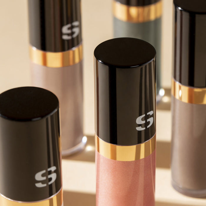 Sisley Ombre Eclat Liquide Stardust NIB eyeshadow in a sleek tube with shimmering, liquid formula for radiant eye looks.