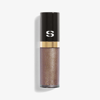 Sisley Ombre Eclat Liquide Stardust NIB liquid eyeshadow in a shimmering shade, displayed on a neutral background.