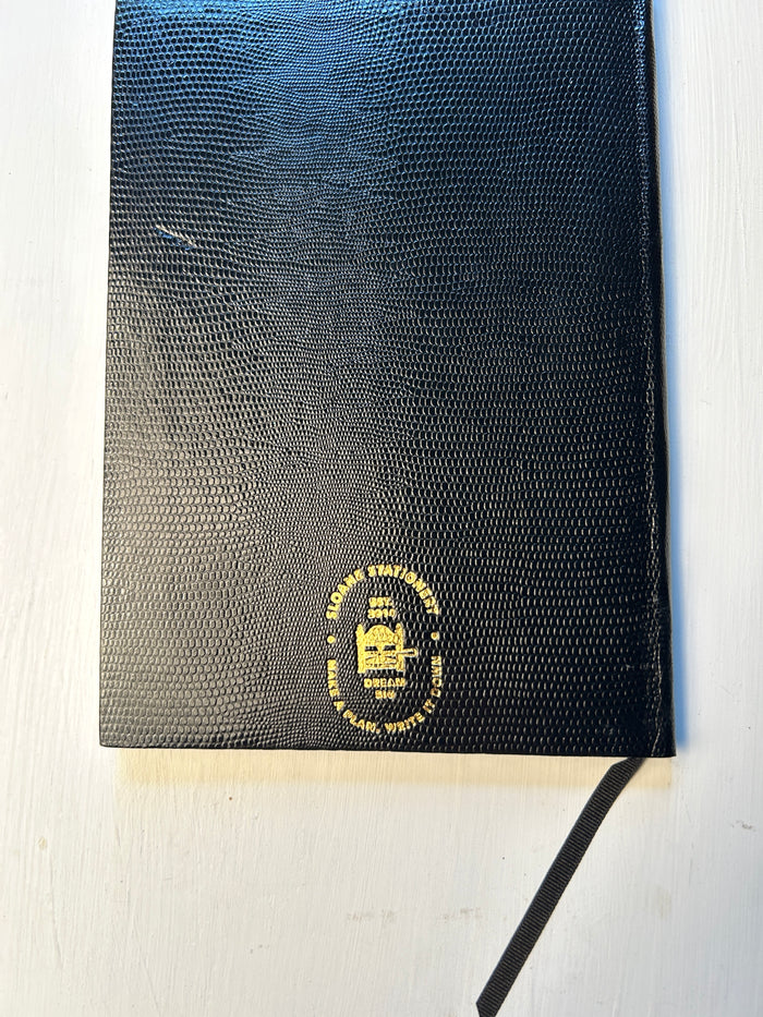 Black Sloane Stationery Make It Happen Journal with lined pages for home or personal use.