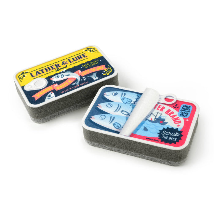 Set of two Fred & Friends TIDY TINS sardines-shaped kitchen sponges with colorful fish design.