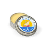 Swedish Dream Lemon Lip Balm by Kalastyle Soap Co. featuring a sleek tube with lemon-scented lip balm on a white background.