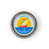 Swedish Dream Lemon Lip Balm by Kalastyle Soap Co. in a closed, natural lip balm tube with lemon scent.