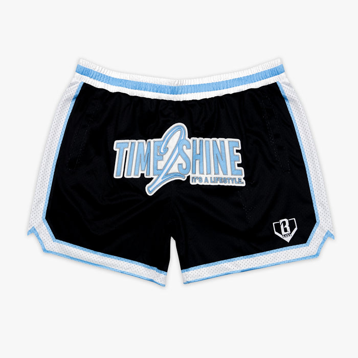 Adult model wearing shorts with "Time 2 Shine" design