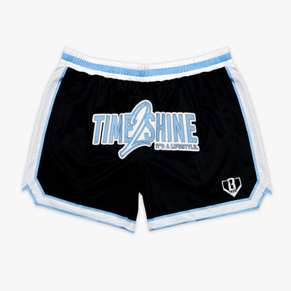Adult model wearing shorts with "Time 2 Shine" design