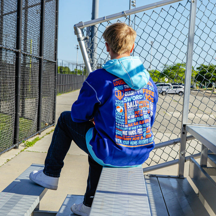 Adult model wearing navy hoodie with "Trash Talk" design