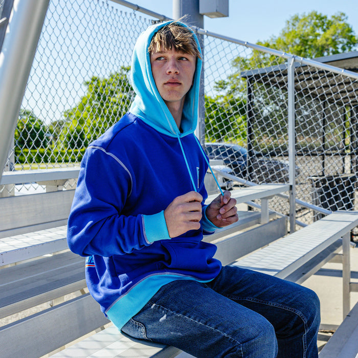 Adult model wearing navy hoodie with "Trash Talk" design