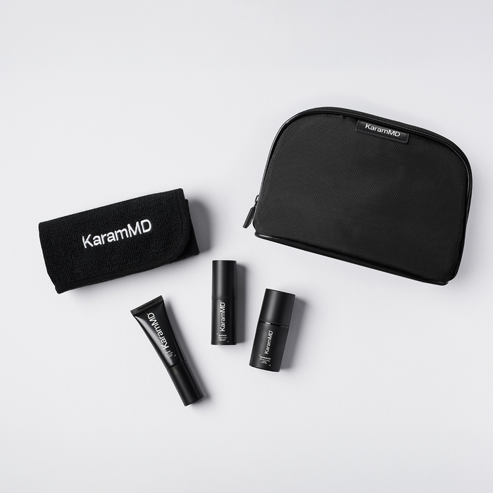 KaramMD travel-sized skincare products including a pouch on a white background