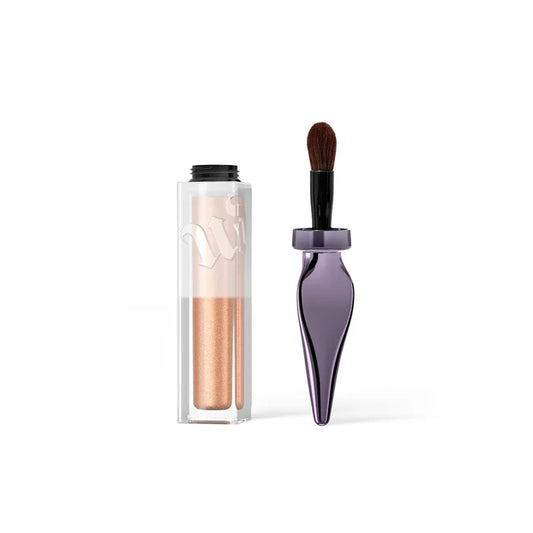 Urban Decay 24/7 Glaze-On Shimmer Liquid Eyeshadow in various shades, showcasing vibrant, shimmering eye makeup in a beauty product image.