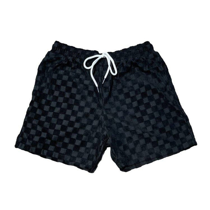 Black Venice Terry Cloth Shorts by Good Days, showing the relaxed fit and soft terry fabric on a model.