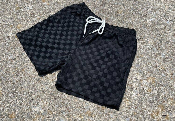 Black Venice Terry Cloth Shorts from Good Days, showcasing a comfortable, casual fit with an elastic waistband and relaxed style.