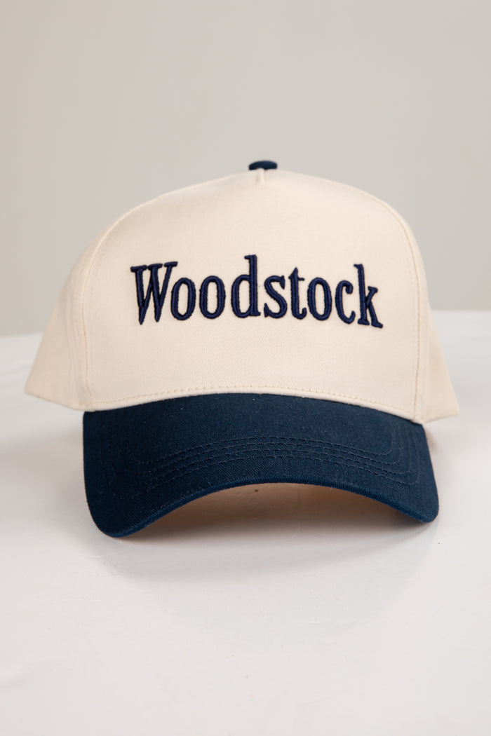 Cap with 'Woodstock' text on a white background