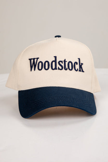 Cap with 'Woodstock' text on a white background