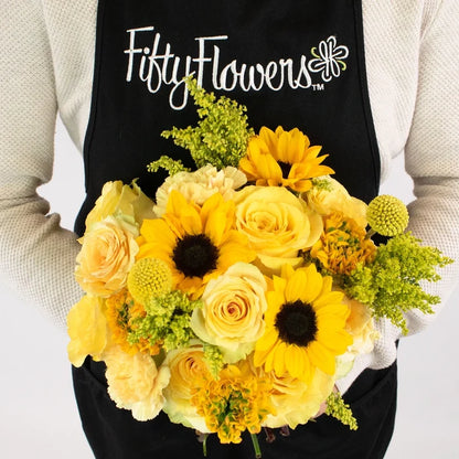 Zanzibar Yellow Flower Centerpiece in Hand